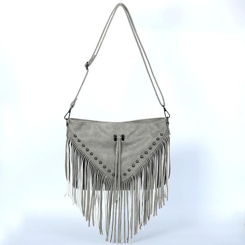 Trendy Riveted Tassel Shoulder Bag – Stylish and Practical Handbag with Tassels and Rivets